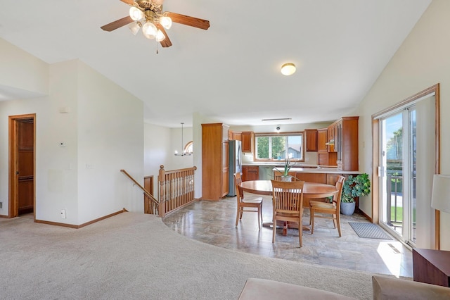 205 4th St NW, Saint Michael, MN 55376 - dining space featuring a ceiling fan, a chandelier, and light colored carpet