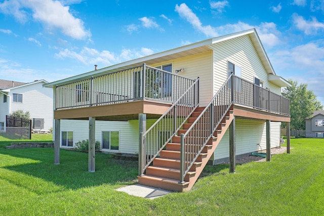 205 4th St NW, Saint Michael, MN 55376 - rear view of house featuring a wooden deck, a yard, and stairs