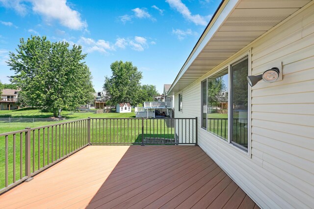 205 4th St NW, Saint Michael, MN 55376 - wooden terrace featuring a yard