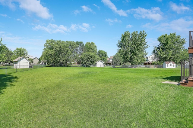 205 4th St NW, Saint Michael, MN 55376 - fenced backyard with a storage shed
