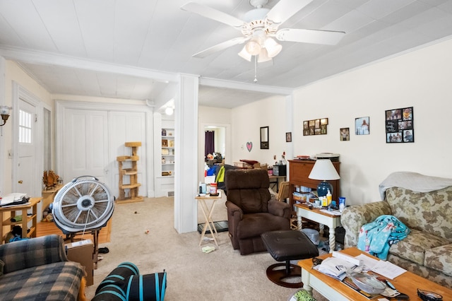 321 6th Ave E, Alexandria, MN 56308 - carpeted living area with a ceiling fan and crown molding
