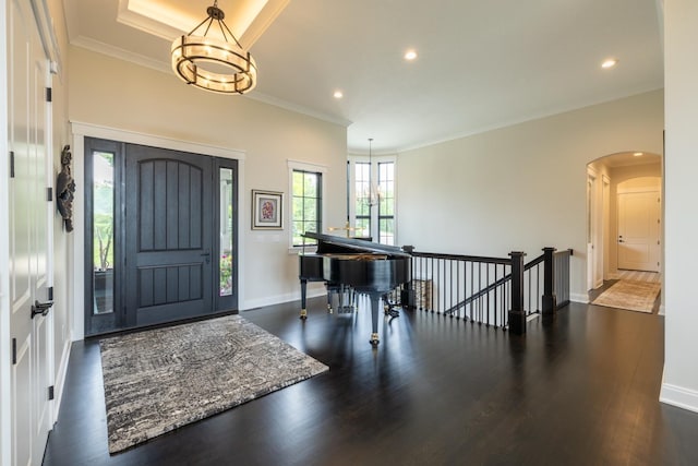 1500 Weatherhill Ridge Ct SW, Rochester Twp, MN 55902 - foyer entrance with wood finished floors, arched walkways, recessed lighting, crown molding, and a chandelier