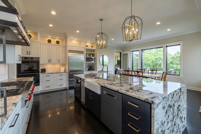 1500 Weatherhill Ridge Ct SW, Rochester Twp, MN 55902 - kitchen with premium range hood, built in appliances, white cabinets, decorative backsplash, and ornamental molding