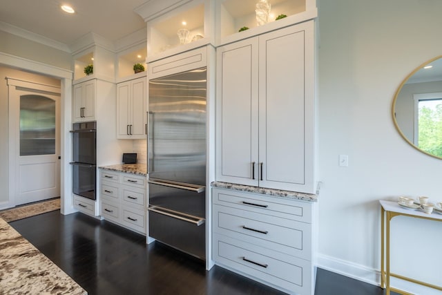 1500 Weatherhill Ridge Ct SW, Rochester Twp, MN 55902 - kitchen with stainless steel built in fridge, light stone counters, dark wood finished floors, crown molding, and white cabinets