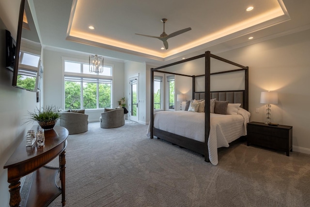 1500 Weatherhill Ridge Ct SW, Rochester Twp, MN 55902 - carpeted bedroom with a tray ceiling, recessed lighting, a chandelier, and a ceiling fan
