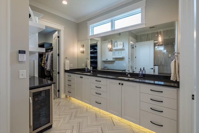 1500 Weatherhill Ridge Ct SW, Rochester Twp, MN 55902 - full bathroom with wine cooler, double vanity, a spacious closet, ornamental molding, and recessed lighting