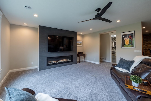 1500 Weatherhill Ridge Ct SW, Rochester Twp, MN 55902 - living area featuring carpet floors, a large fireplace, recessed lighting, and ceiling fan