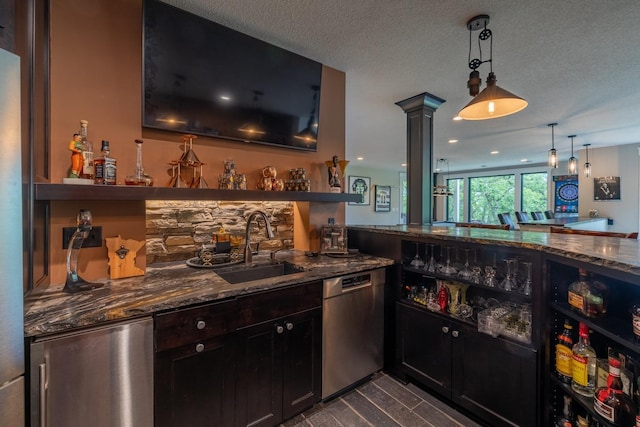 1500 Weatherhill Ridge Ct SW, Rochester Twp, MN 55902 - indoor wet bar with dishwasher, fridge, decorative columns, decorative light fixtures, and a textured ceiling