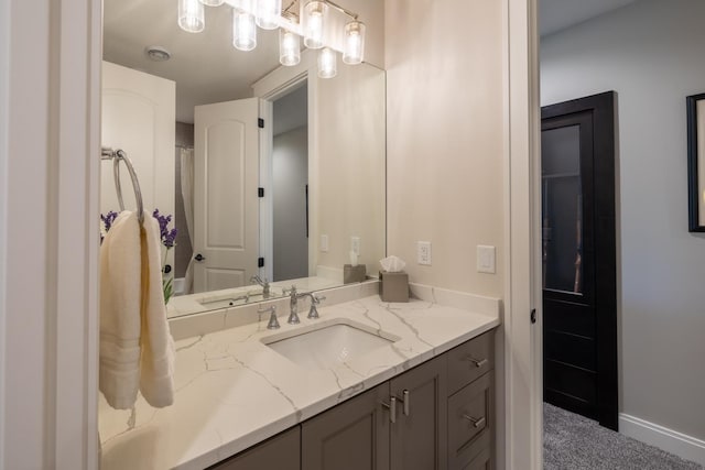 1500 Weatherhill Ridge Ct SW, Rochester Twp, MN 55902 - bathroom with vanity and baseboards