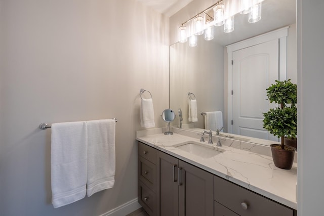 1500 Weatherhill Ridge Ct SW, Rochester Twp, MN 55902 - bathroom featuring vanity and baseboards