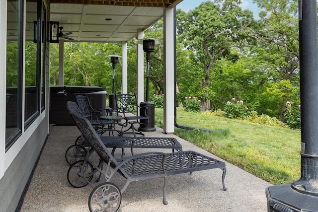 1500 Weatherhill Ridge Ct SW, Rochester Twp, MN 55902 - view of patio featuring a hot tub
