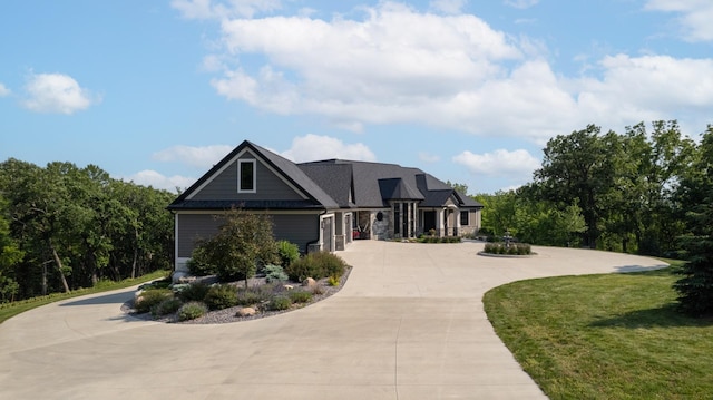 1500 Weatherhill Ridge Ct SW, Rochester Twp, MN 55902 - view of front of home featuring curved driveway and a front yard