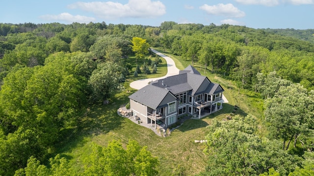 1500 Weatherhill Ridge Ct SW, Rochester Twp, MN 55902 - aerial view of property and surrounding area with a heavily wooded area