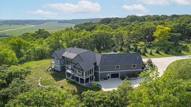 1500 Weatherhill Ridge Ct SW, Rochester Twp, MN 55902 - aerial view of property and surrounding area with a forest