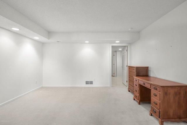 8425 Rice Lake Rd, Maple Grove, MN 55369 - basement with recessed lighting, a textured ceiling, and light colored carpet