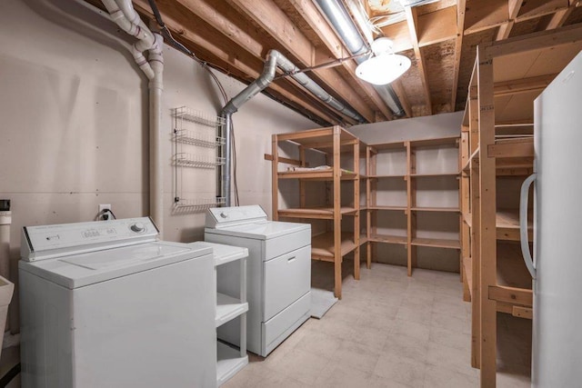 8425 Rice Lake Rd, Maple Grove, MN 55369 - laundry room featuring washing machine and dryer and light flooring