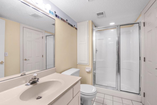 8425 Rice Lake Rd, Maple Grove, MN 55369 - bathroom featuring a textured ceiling, a shower stall, vanity, and tile patterned flooring