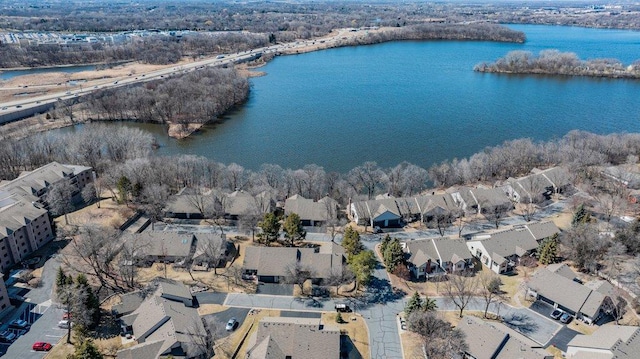 8425 Rice Lake Rd, Maple Grove, MN 55369 - aerial view of property and surrounding area featuring a nearby body of water and nearby suburban area