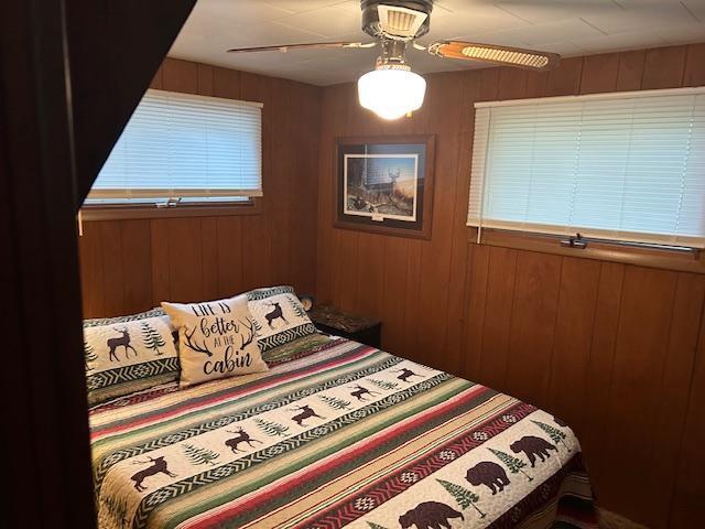1906 Hay Lake Dr NW, Ponto Lake Twp, MN 56474 - bedroom with wooden walls