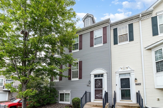 7710 Elm Grove Ct, New Hope, MN 55428 - townhome / multi-family property with entry steps