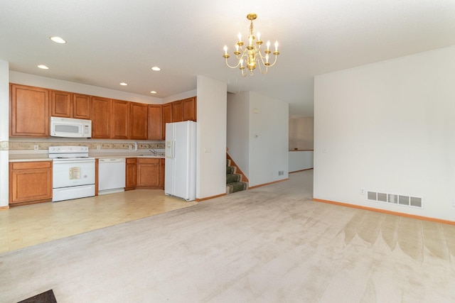 7710 Elm Grove Ct, New Hope, MN 55428 - kitchen featuring white appliances, open floor plan, a chandelier, light countertops, and recessed lighting