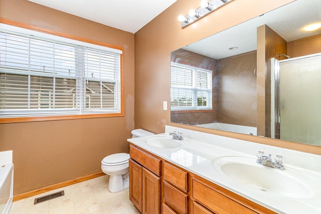 7710 Elm Grove Ct, New Hope, MN 55428 - bathroom featuring a garden tub, double vanity, and a shower stall