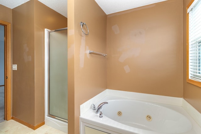 7710 Elm Grove Ct, New Hope, MN 55428 - full bath featuring a stall shower, a jetted tub, and a textured ceiling