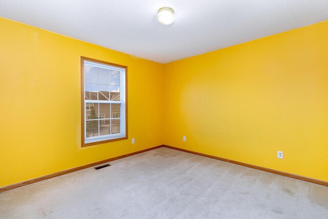 7710 Elm Grove Ct, New Hope, MN 55428 - empty room with baseboards and carpet