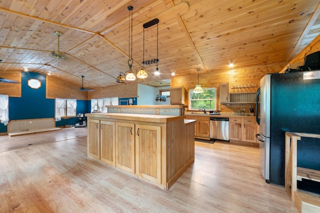 4767 Mccomber Rd, Duluth, MN 55803 - kitchen with appliances with stainless steel finishes, light wood finished floors, light brown cabinets, wood ceiling, and plenty of natural light
