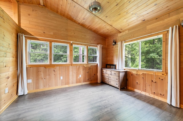 4767 Mccomber Rd, Duluth, MN 55803 - unfurnished room with vaulted ceiling, wood-type flooring, wood walls, and wooden ceiling