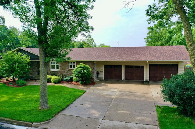 701 Oak Ave, Olivia, MN 56277 - ranch-style house featuring an attached garage, driveway, a front yard, and a shingled roof