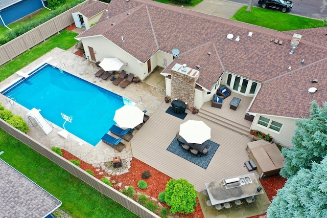 701 Oak Ave, Olivia, MN 56277 - aerial view of property and surrounding area featuring a pool area