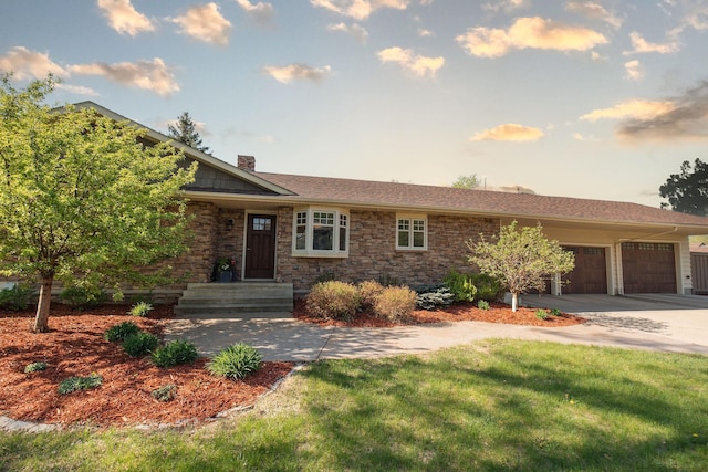 701 Oak Ave, Olivia, MN 56277 - view of front of house with a garage, concrete driveway, a chimney, and a front lawn