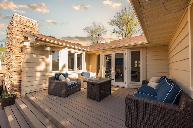 701 Oak Ave, Olivia, MN 56277 - wooden deck featuring french doors and an outdoor hangout area