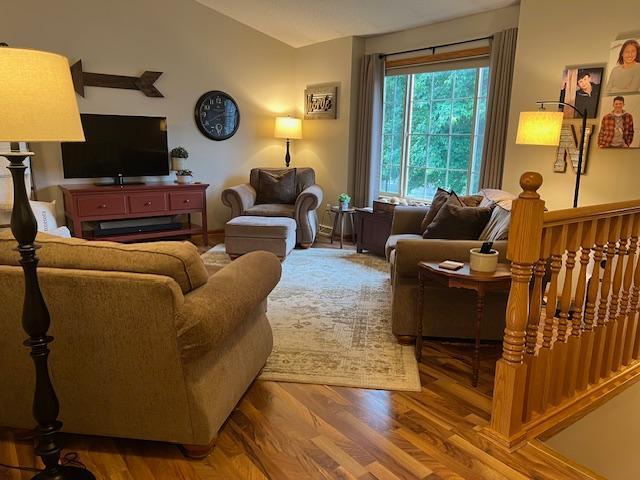 302 Peifer Dr, Litchfield, MN 55355 - living area featuring wood finished floors