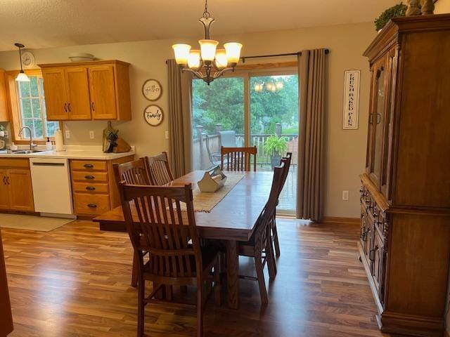 302 Peifer Dr, Litchfield, MN 55355 - dining space with light wood finished floors and a chandelier
