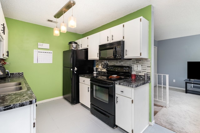 6668 84th Ct N, Brooklyn Park, MN 55445 - kitchen with black appliances, dark countertops, white cabinetry, decorative backsplash, and a textured ceiling