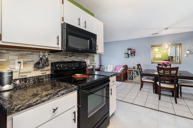 6668 84th Ct N, Brooklyn Park, MN 55445 - kitchen with black appliances, decorative backsplash, white cabinets, light tile patterned floors, and hanging light fixtures