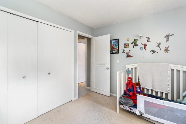 6668 84th Ct N, Brooklyn Park, MN 55445 - carpeted bedroom with a closet and a textured ceiling