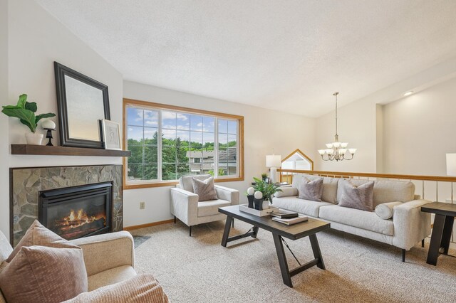 6936 Lake Ter E, Woodbury, MN 55125 - living area with a chandelier, carpet flooring, a fireplace, and vaulted ceiling