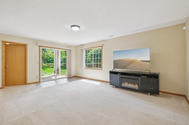 6936 Lake Ter E, Woodbury, MN 55125 - unfurnished living room featuring carpet, a textured ceiling, and tile patterned floors