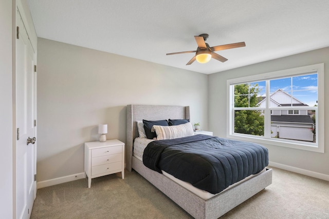 18175 61st Ave N, Plymouth, MN 55446 - bedroom featuring light carpet and a ceiling fan