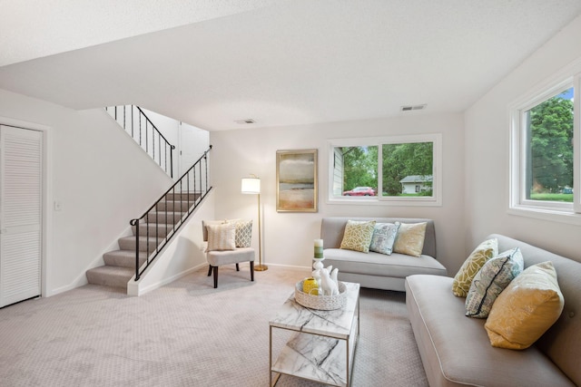 12908 Belle Aire Dr, Champlin, MN 55316 - living area featuring carpet floors and stairs