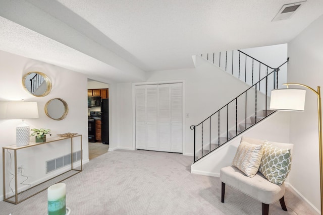 12908 Belle Aire Dr, Champlin, MN 55316 - entryway with light carpet and stairway