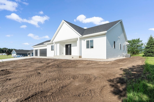 1720 Summer Ln NE, Alexandria, MN 56308 - view of front of home featuring an attached garage, roof with shingles, and driveway