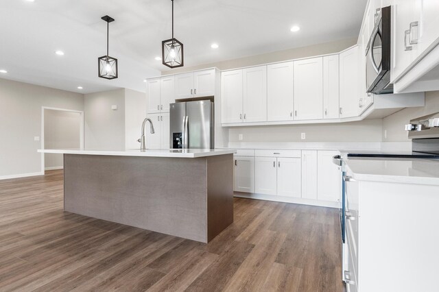 1720 Summer Ln NE, Alexandria, MN 56308 - kitchen featuring appliances with stainless steel finishes, light wood finished floors, recessed lighting, and light countertops