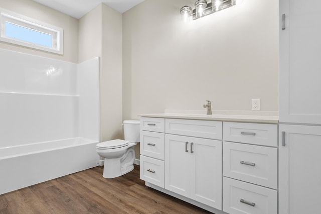 1720 Summer Ln NE, Alexandria, MN 56308 - bathroom with vanity, wood finished floors, and tub / shower combination