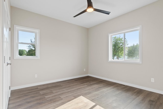 1720 Summer Ln NE, Alexandria, MN 56308 - spare room featuring wood finished floors and ceiling fan