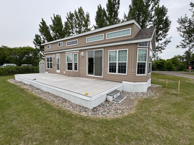 1540 US Highway 59 Unit 203, Detroit Lakes, MN 56501 - rear view of house with a yard and board and batten siding