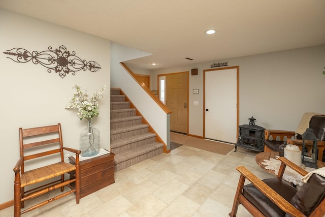4887 Tee Ct SW, Rochester, MN 55902 - stairs featuring recessed lighting and a wood stove